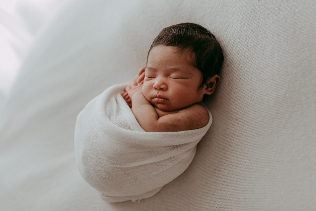 precious newborn girl in melbourne studio for her family portraits