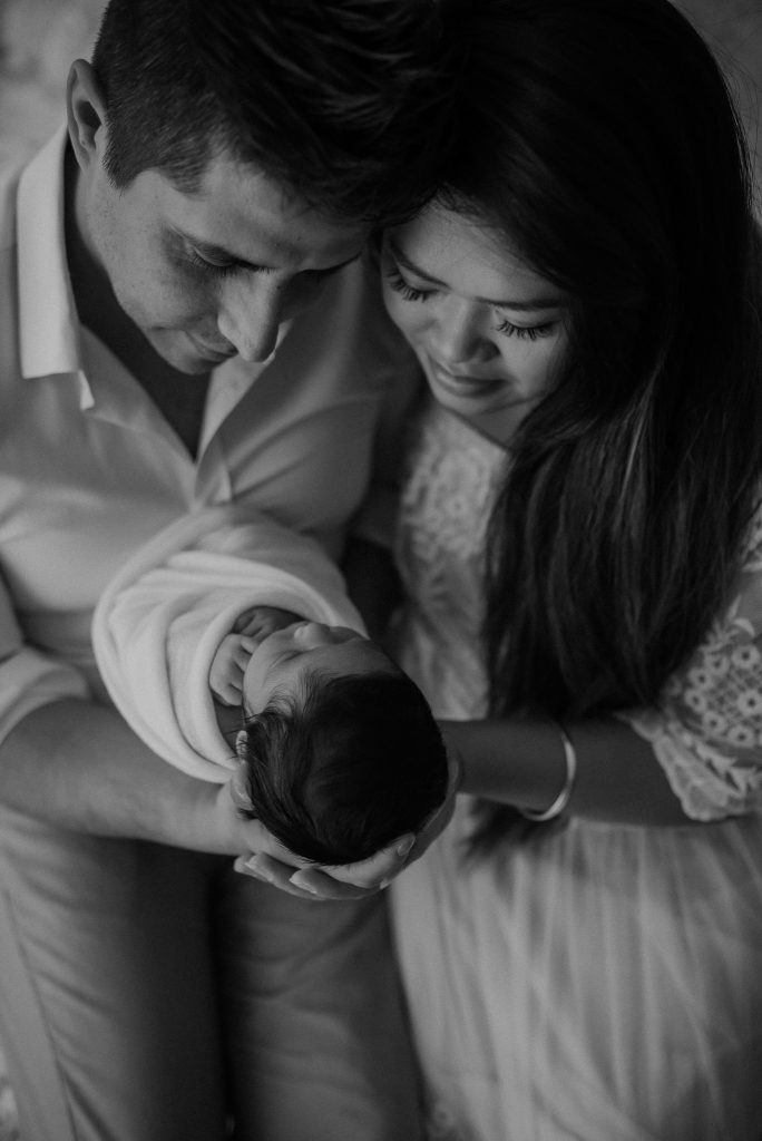 new family with their new baby girl