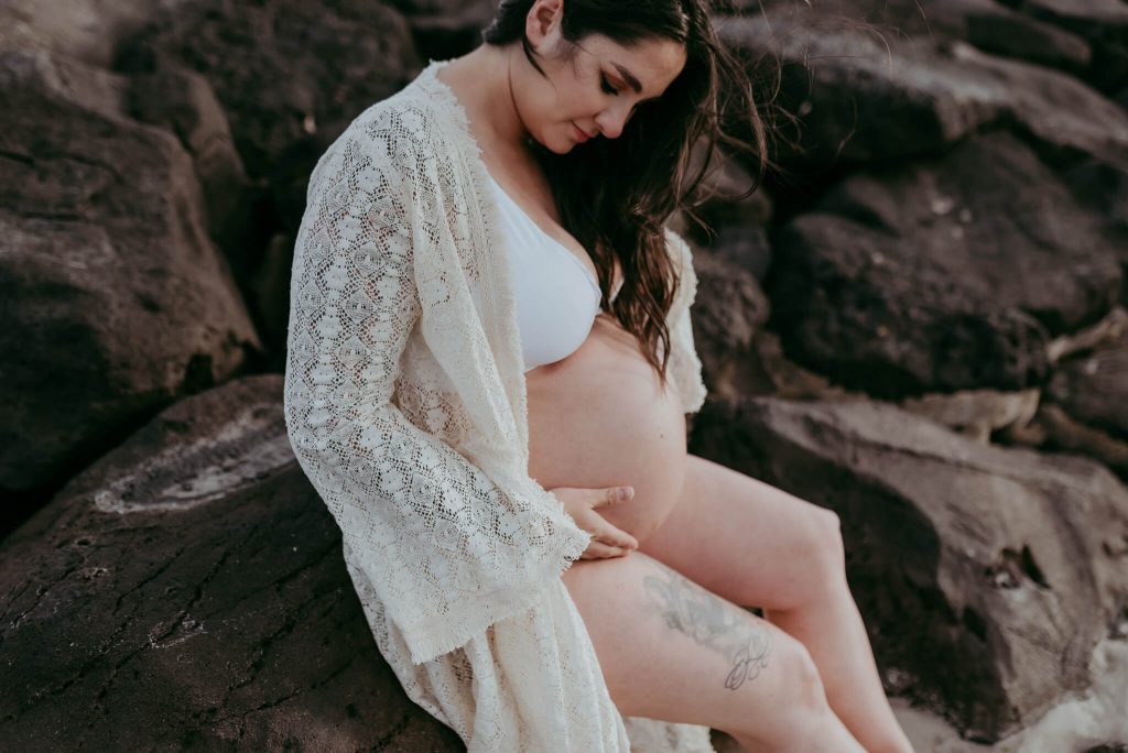 maternity photographed on beach