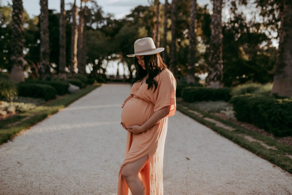 belly photographed with beautiful dress