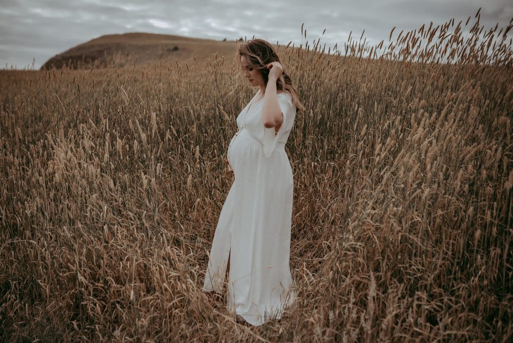 posing in front of camera