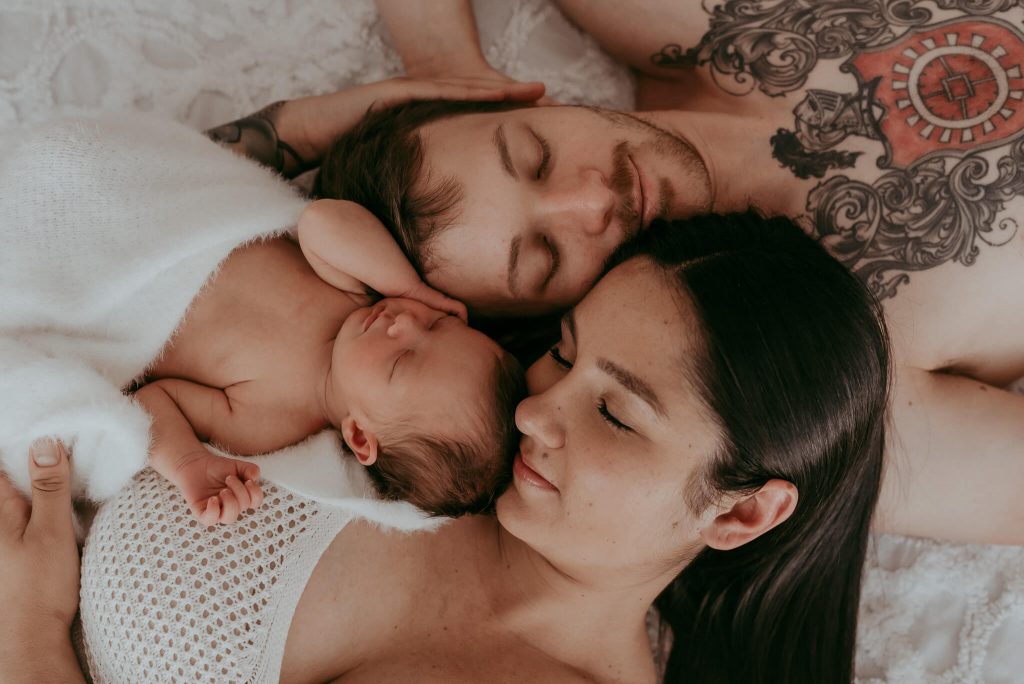 photo of new family with baby