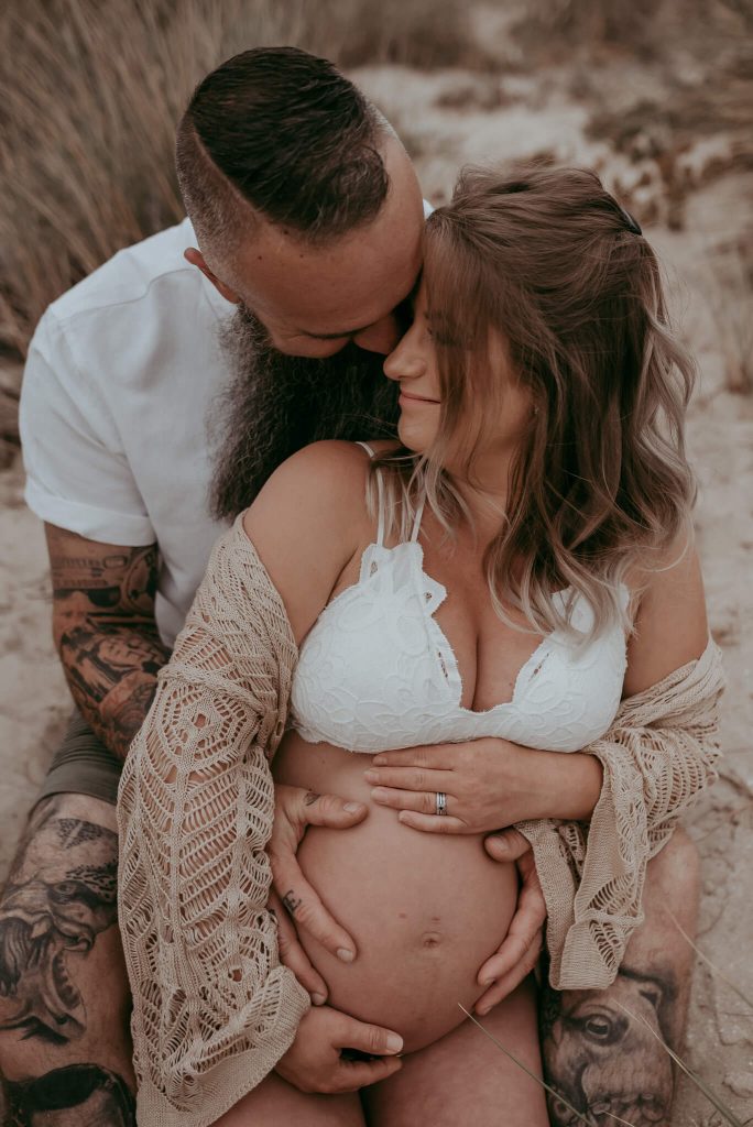 maternity love photographed on the beach of melbourne