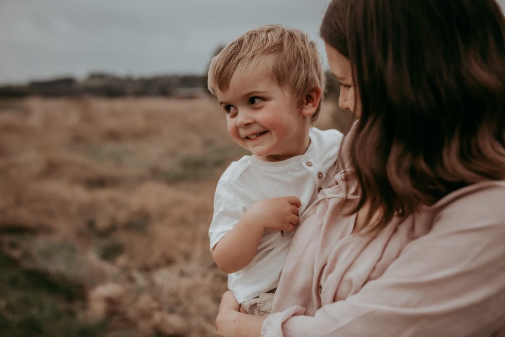 crazy fun photography session with mother and her boys