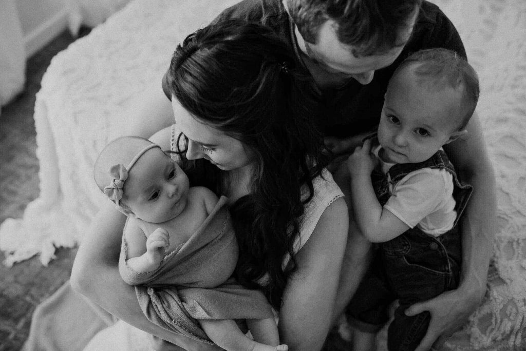 family growing with newborn