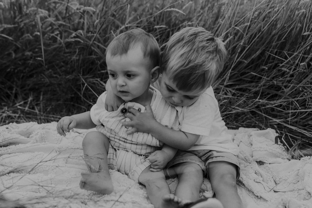 brothers having fun during family session