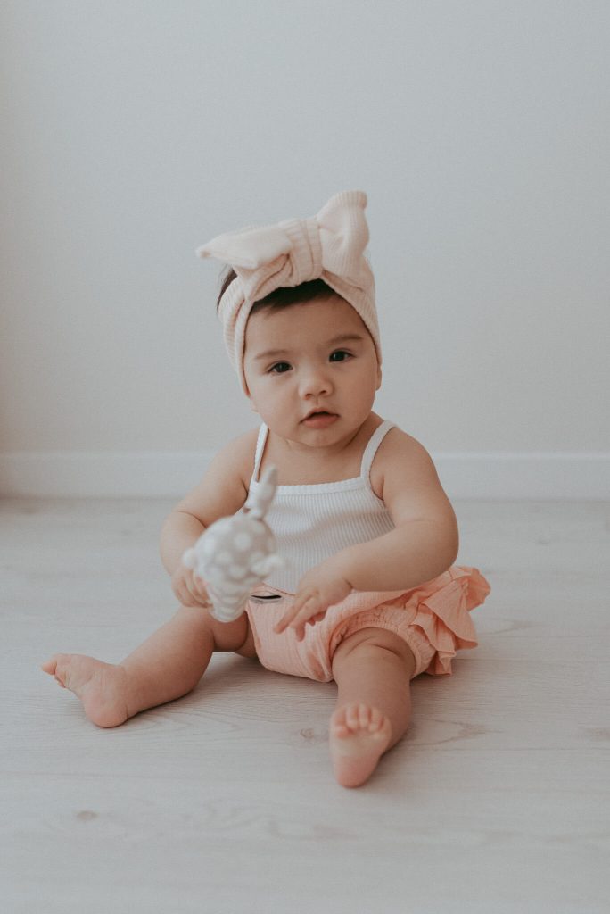 baby sitting on her own