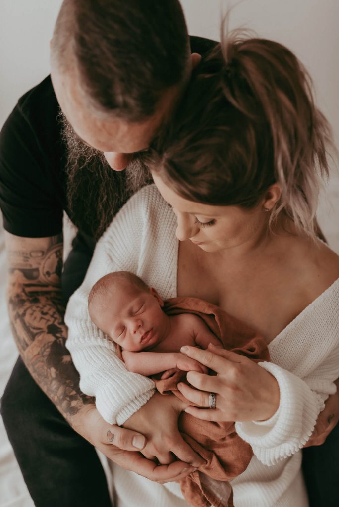 son photographer with mother and father together