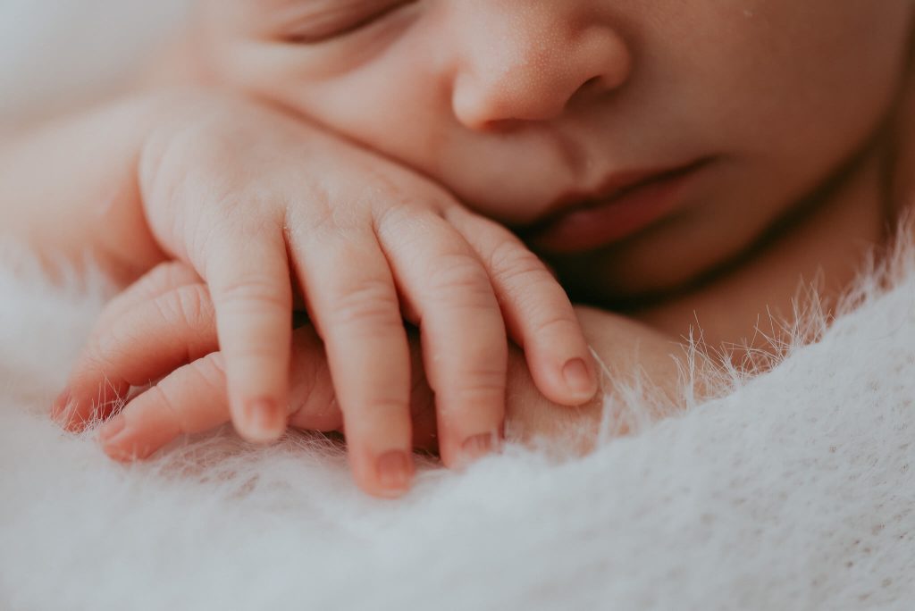 close up images of baby fingers